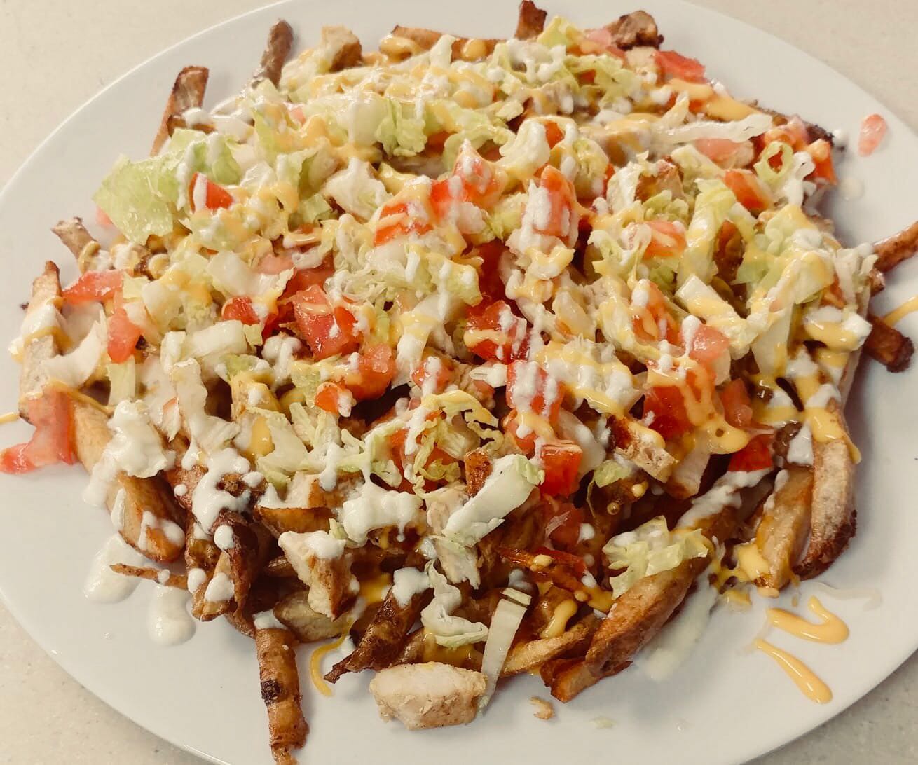 TB Fries with Cheese, Sour Cream and Meat